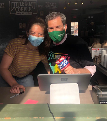 Staff at Little Goat Coffee Company and a Fox 29 news anchor.