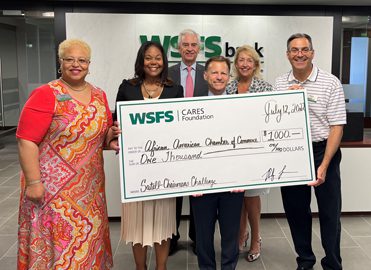 WSFS Associates present a giant check for $1,000 to The African-American Chamber of Commerce of PA, NJ and DE (AACC).