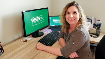 A WSFS Associate at her desk.