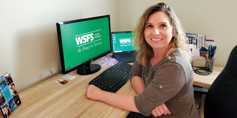 A WSFS Associate at her desk.