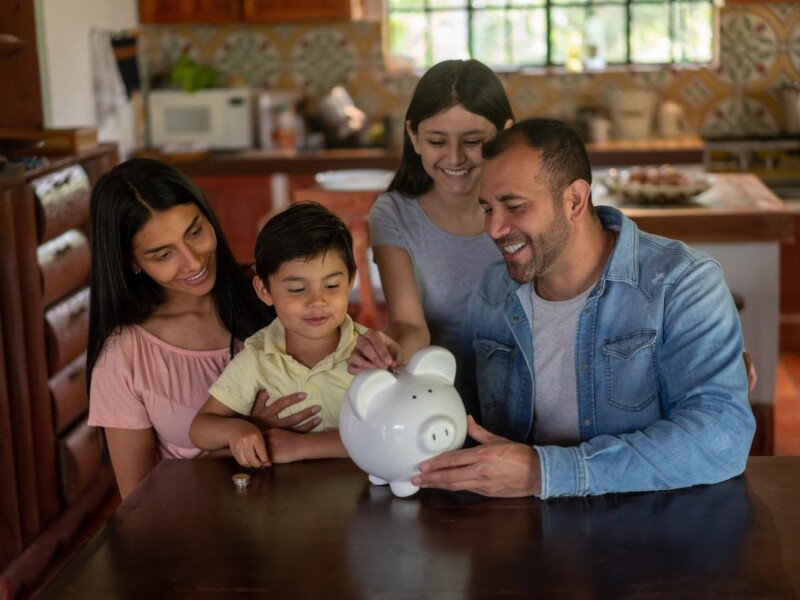 Family with piggy bank.
