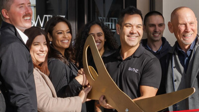 StriveWell co-founders Rico Macaraeg and Steven Schnelle cut the ribbon on their first SWTHZ location in New Jersey.