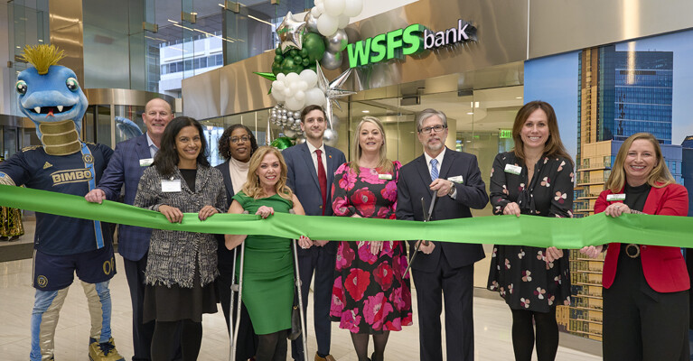 WSFS Bank Chairman, President and CEO, Rodger Levenson, and Chief Consumer Banking Officer, Shari Kruzinski, were joined by state, city and local representatives to celebrate the banking office and Wiss Fiss Lounge Grand Opening.