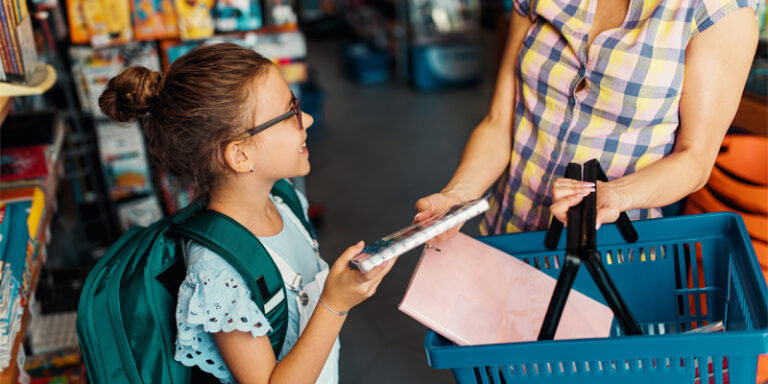 A student shopping with their parent.