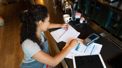 A small business owner working on paperwork.