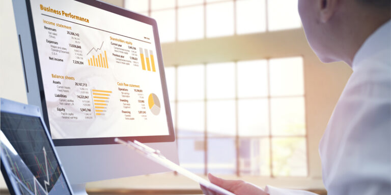 A man looking at a computer screen.