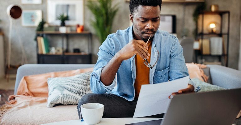 A man reviewing documents.