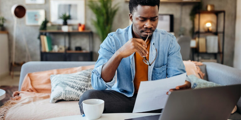 A man reviewing documents.