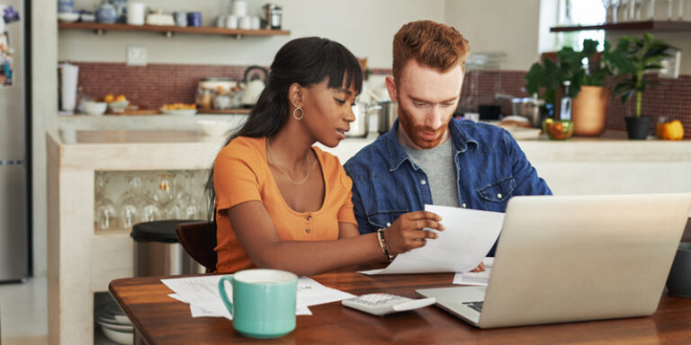 A couple reviewing documents.