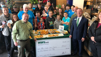 The Crab Cake Company with WSFS Bank prop check for $1000.