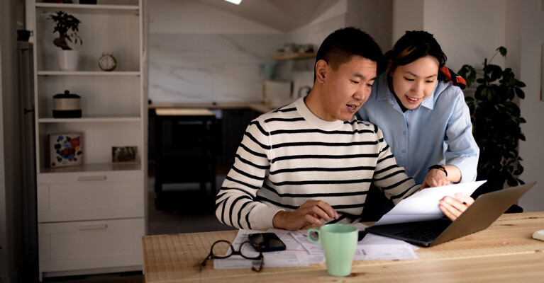 A couple reviewing their finances.