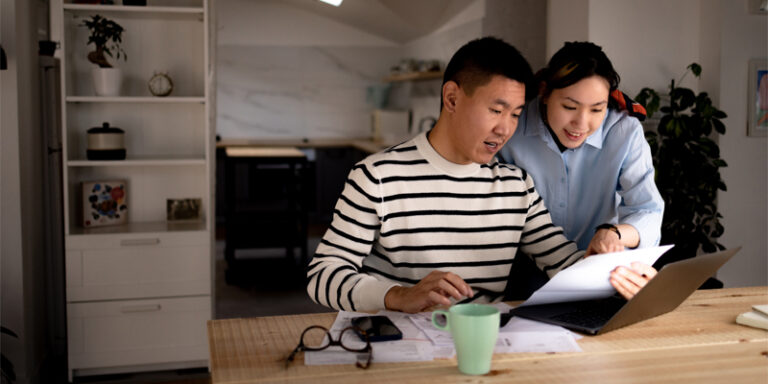 A couple reviewing their finances.