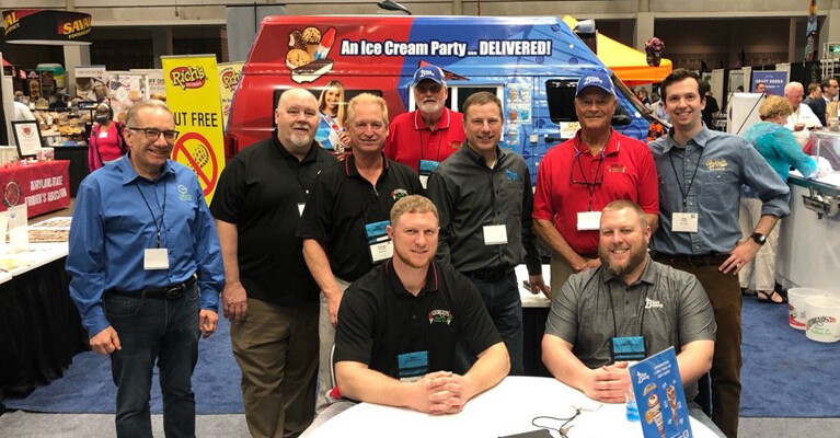 Georgeo’s Water Ice Inc. employees at a trade show.