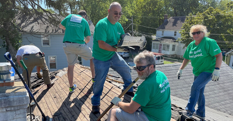 WSFS Associates repairing a damaged roof.