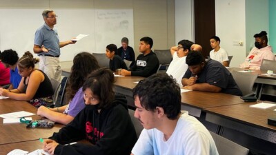 A classroom at Guadalupe Family Services learning about financial literacy.