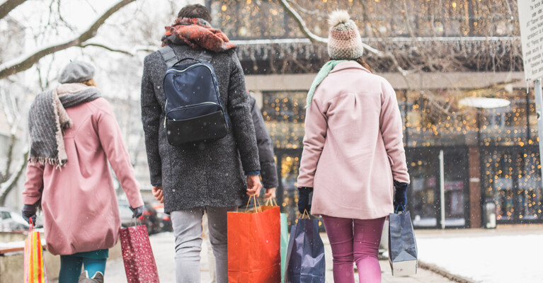 A family doing holiday shopping.