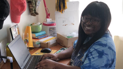 A WSFS Intern using the computer.