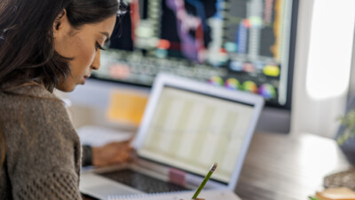 Woman using laptop.