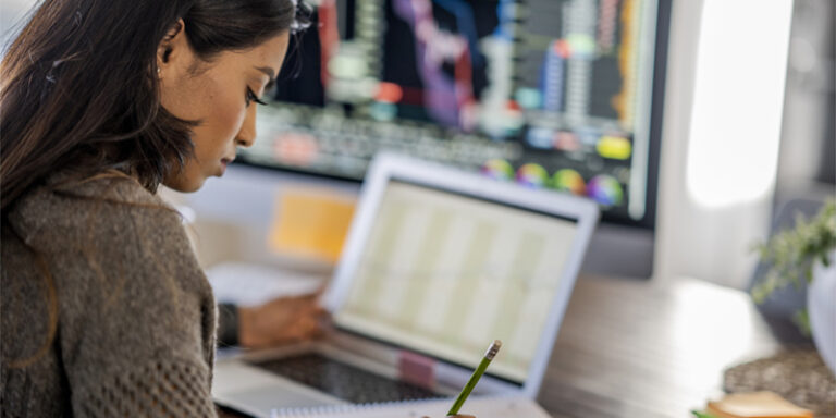 Woman using laptop.