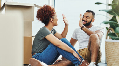 New homeowners amongst moving boxes.