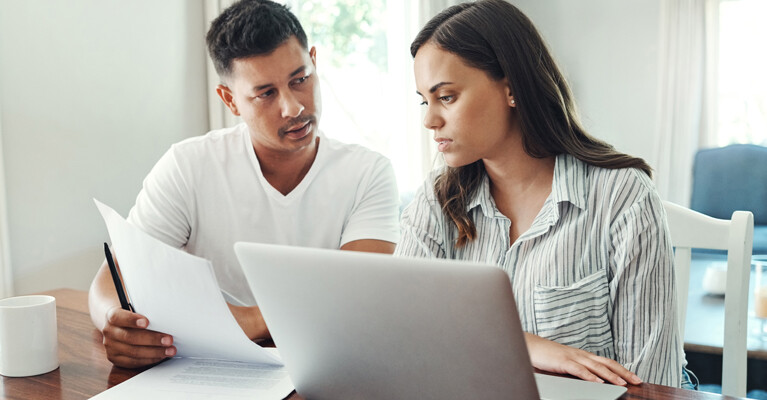 A couple reviewing their finances.