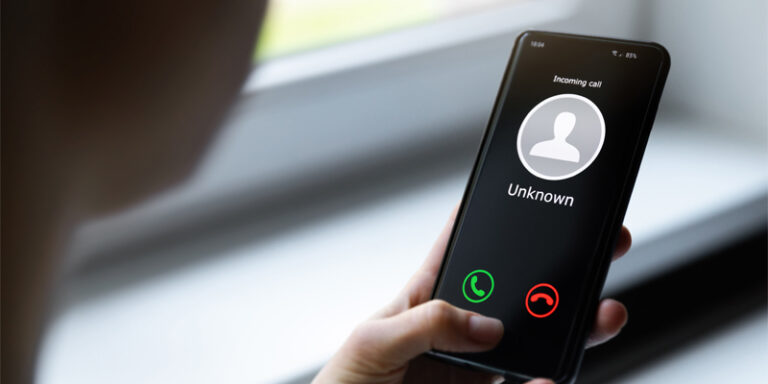 An unknown call coming in on a cell phone.