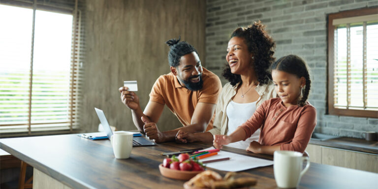 A family reviewing their finances together.