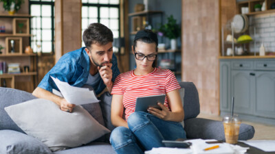 A couple reviewing their budget and finances for the new year.