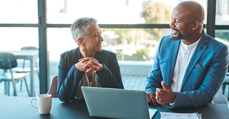 A financial advisor discussing retirement planning with a client.