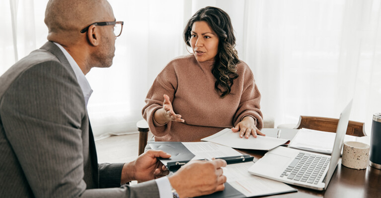 A private banker meeting with their client.