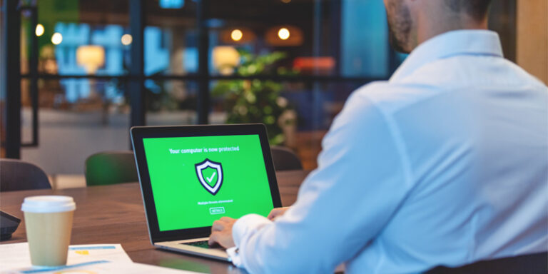 Security-oriented person looking at a computer notification.