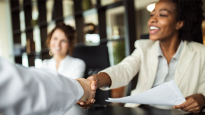 Businesspeople shaking hands.