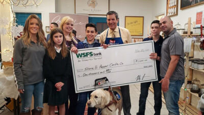WSFS Associates with a $1000 check for the Shane & Pepper Candle Company.