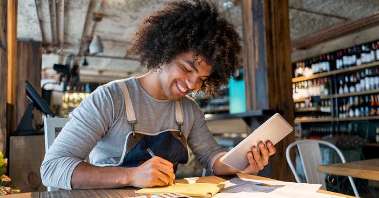 A small business owner managing the business’ finances.