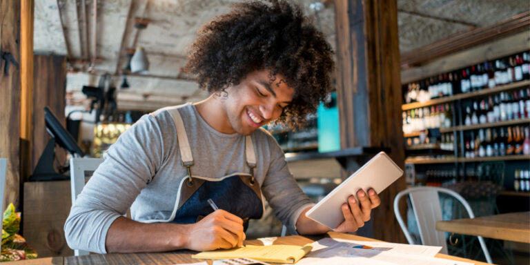 A small business owner managing the business’ finances.