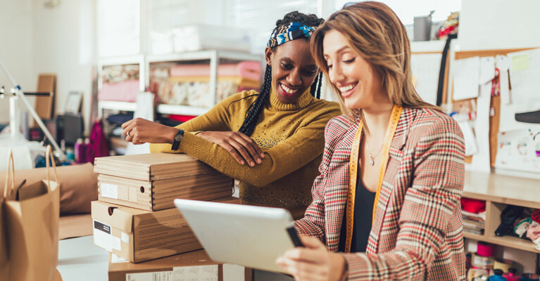 Two Small Business owners collaborating at work.