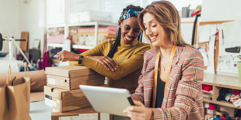 Two Small Business owners collaborating at work.