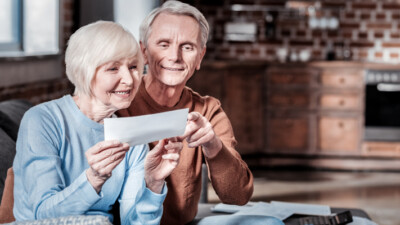 A couple reviewing their Social Security check.