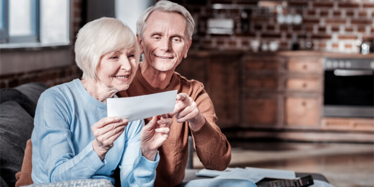 A couple reviewing their Social Security check.