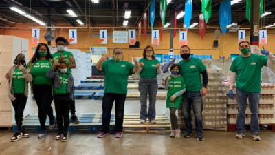 WSFS Associates and their children volunteering.