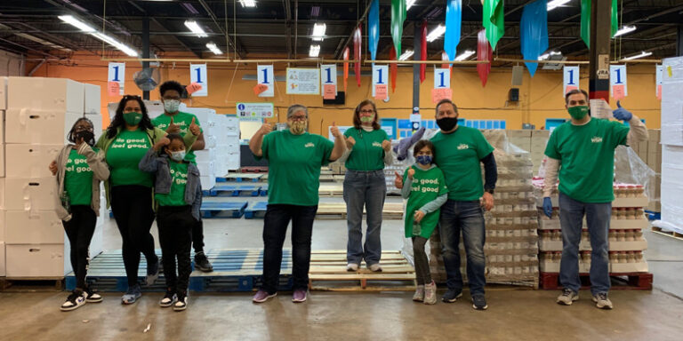WSFS Associates and their children volunteering.