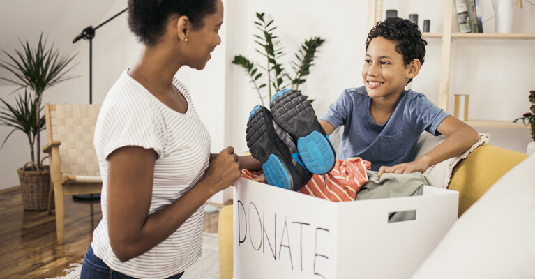 A parent teaching their child about giving.