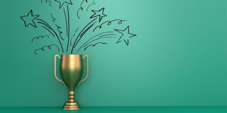 Trophy with star drawings coming out of it.