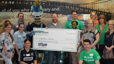 The WSFS Bank team presenting a check for $5,000 to CityTeam Chester.