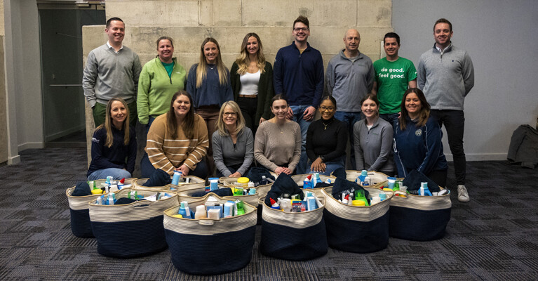 WSFS Team Members posing in front of donated items.