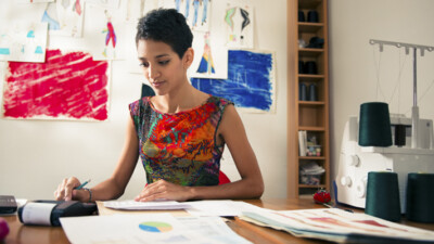 Woman looking at paperwork.