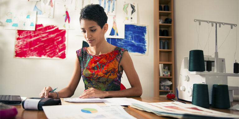 Woman looking at paperwork.