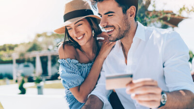 A couple using their credit card.
