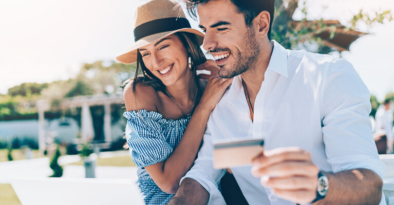 A couple using their credit card.