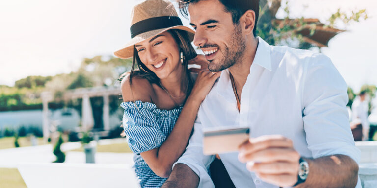 A couple using their credit card.